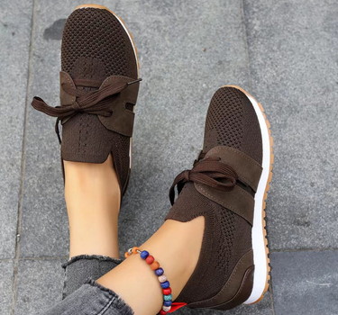 Brown Women’s Orthopedic-Ergonomic Fit Sneakers on the model