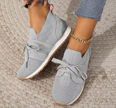 Gray Women’s Orthopedic-Ergonomic Fit Sneakers on the model