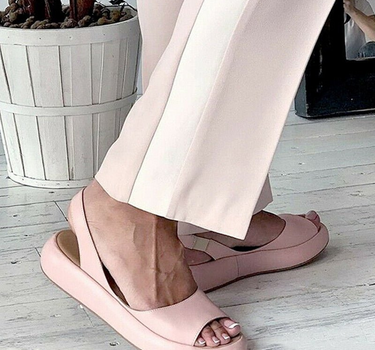 Pink Women’s Casual Footbed Slip-On Sandals on the model