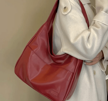 Women’s Red Spacious Leather Shoulder Bag on model