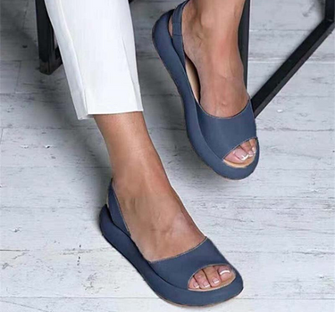 Blue Women’s Casual Footbed Slip-On Sandals on the model