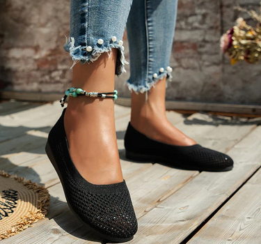 Black Women’s Breathable Mesh Slip-On Flats on the model