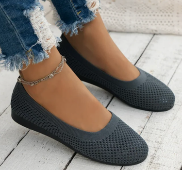 Gray Women’s Breathable Mesh Slip-On Flats on the model