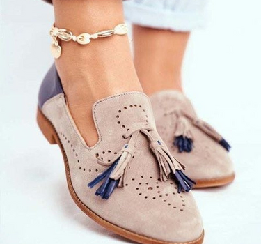 Khaki Women’s Classic Tassel Slip-On Loafers on the model
