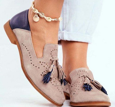 Khaki Women’s Classic Tassel Slip-On Loafers on the model