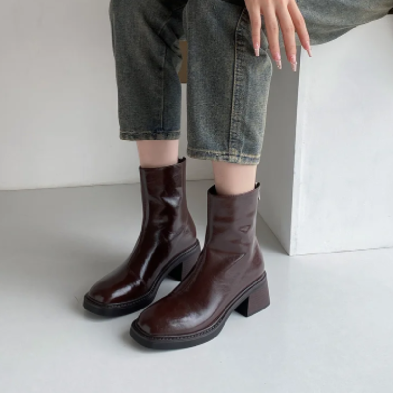 Brown Women’s Modern Square Toe Ankle Boots on the model