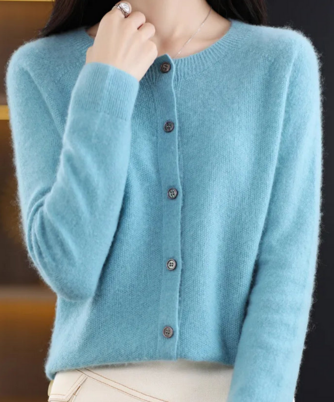 Light Blue Women’s Elegant V-Neck Button-Detailed Sweater on the model