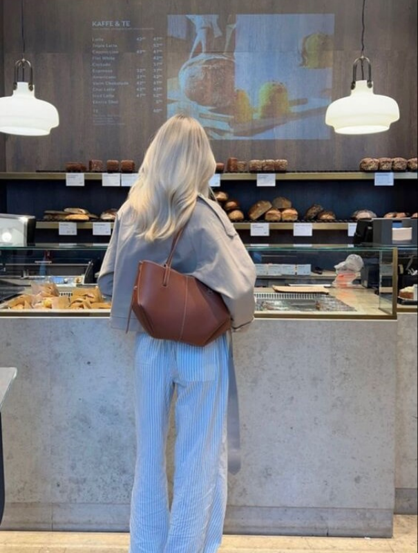 Brown Women’s Vintage Spacious Design Tote Bag on the model
