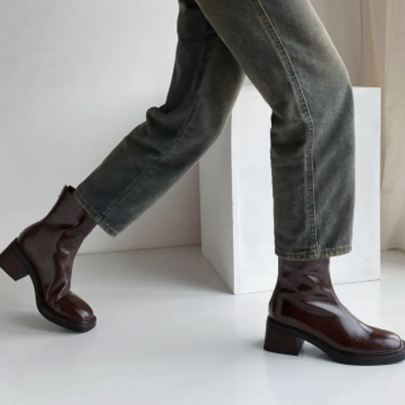 Brown Women’s Modern Square Toe Ankle Boots on the model