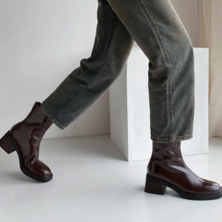 Brown Women’s Modern Square Toe Ankle Boots on the model