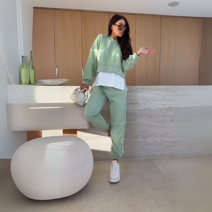 Green Women’s Coordinated Minimalist Fit Tracksuit Set on the model