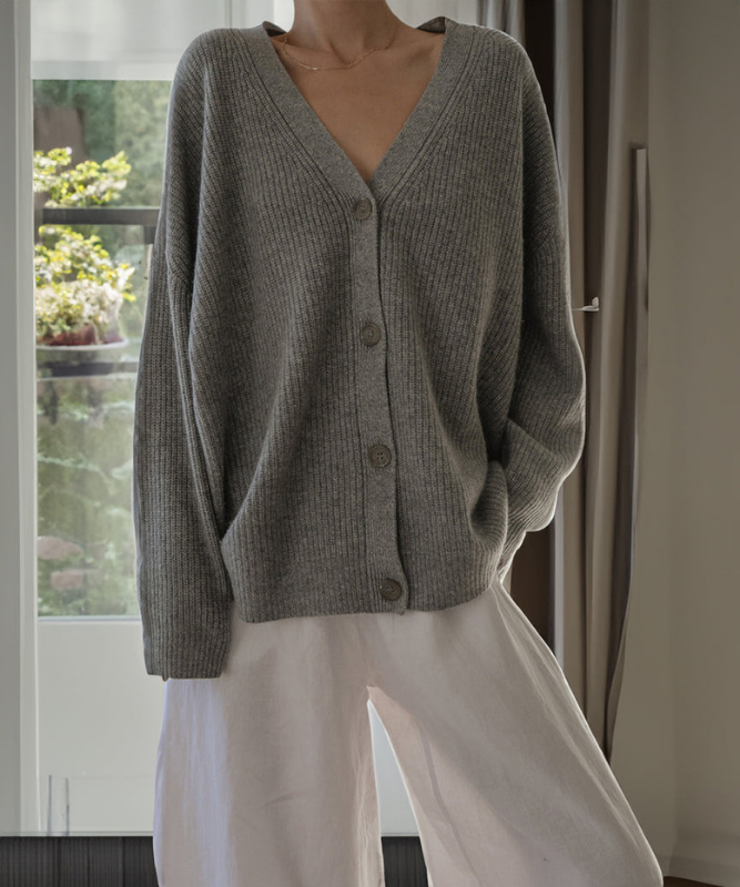 Gray Women’s V-Neck Button Closure Knit Cardigan on the model
