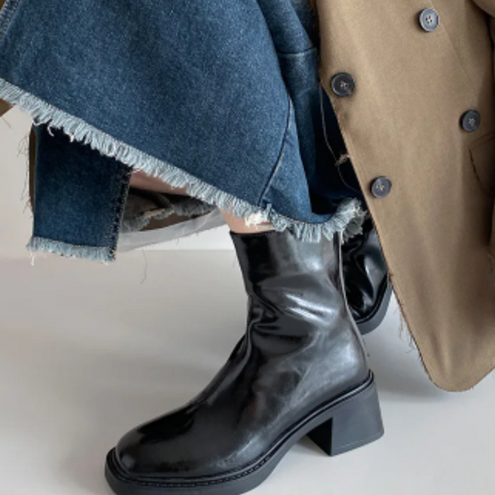 Black Women’s Modern Square Toe Ankle Boots on the model