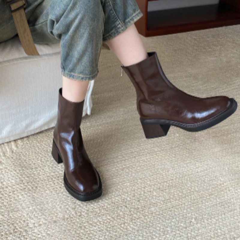 Brown Women’s Modern Square Toe Ankle Boots on the model