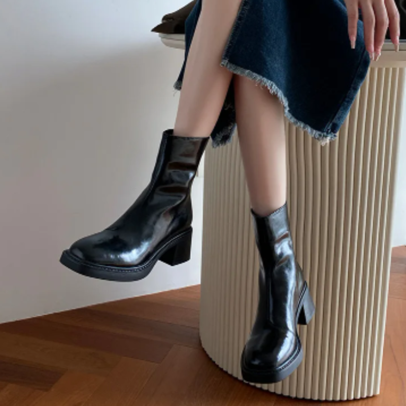 Black Women’s Modern Square Toe Ankle Boots on the model