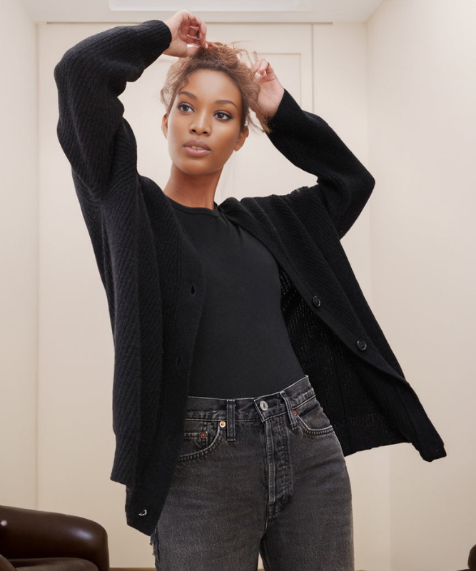 Black Women’s V-Neck Button Closure Knit Cardigan on the model