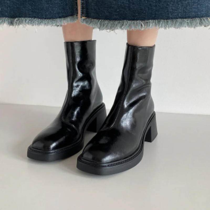 Black Women’s Modern Square Toe Ankle Boots on the model