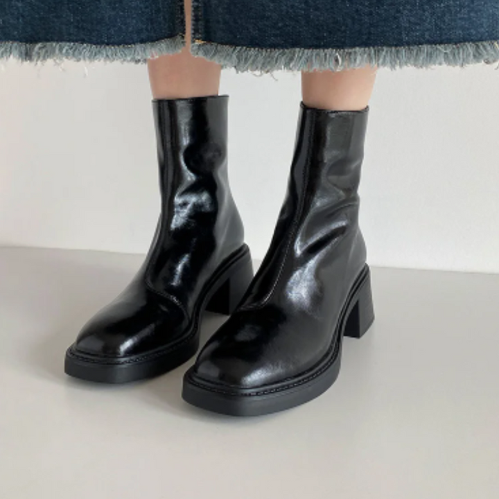 Black Women’s Modern Square Toe Ankle Boots on the model