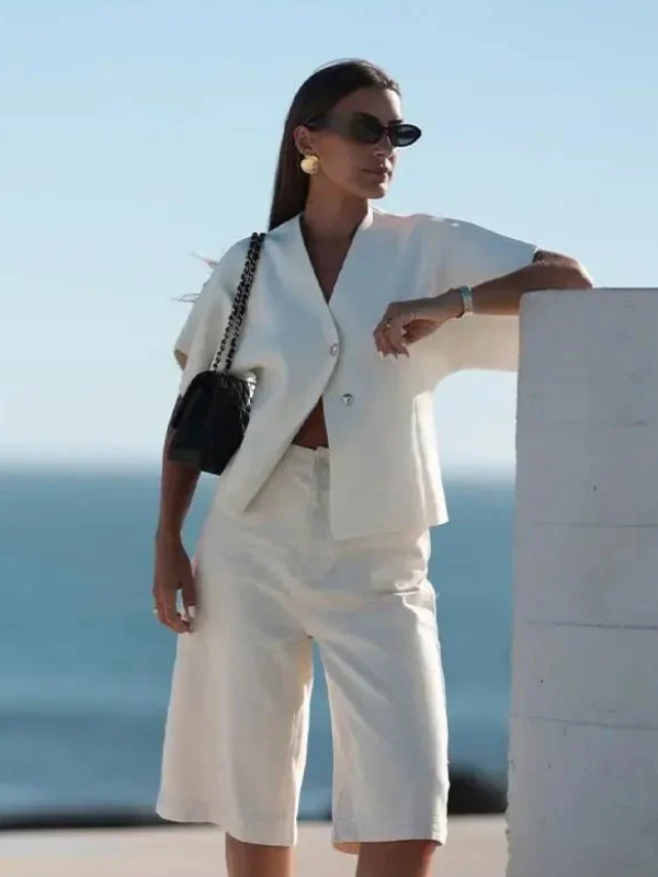 White Women’s Minimal V-Neck Blouse Two-Button on model 