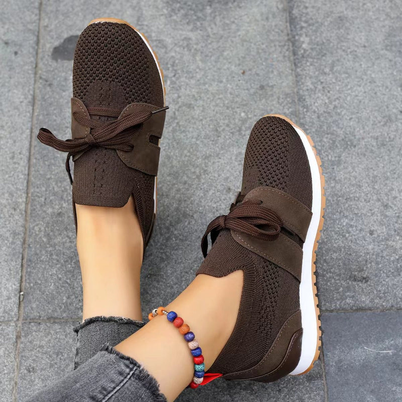 Brown Women’s Orthopedic-Ergonomic Fit Sneakers on the model