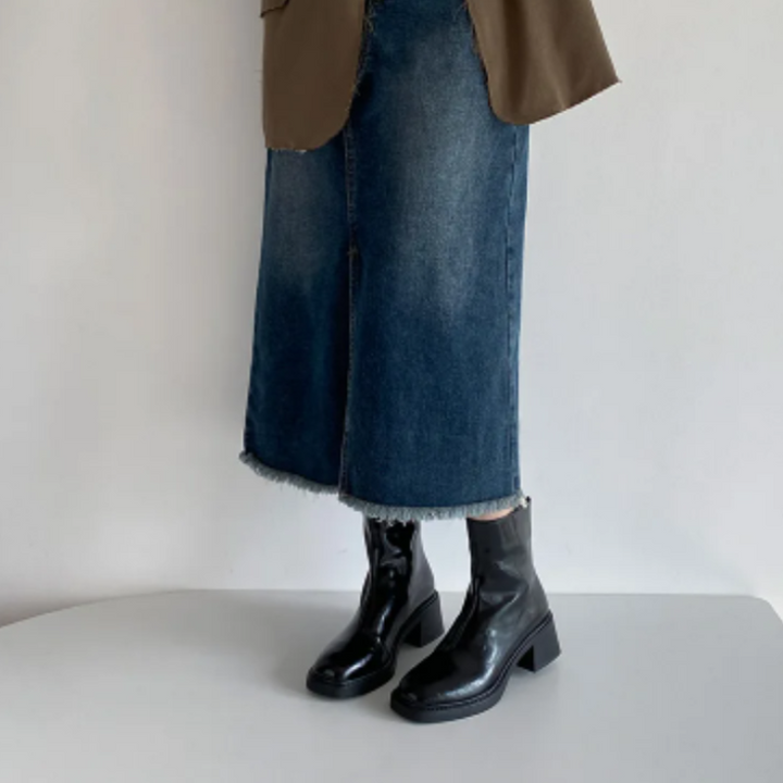 Black Women’s Modern Square Toe Ankle Boots on the model