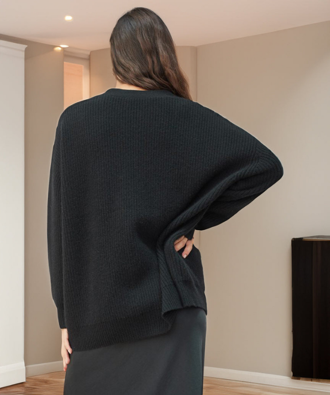 Black Women’s V-Neck Button Closure Knit Cardigan on the model