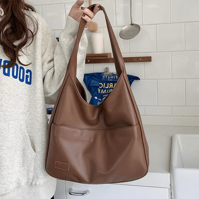 Women’s Brown Spacious Leather Shoulder Bag on model