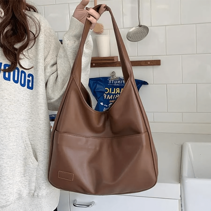 Women’s Brown Spacious Leather Shoulder Bag on model