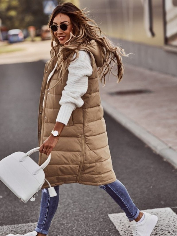 Beige Women’s Knee-Length Quilted Vest on the model