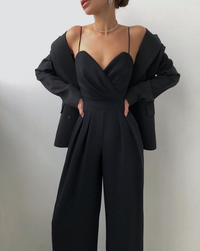 Black Women’s Elegant Sweetheart Neckline Wide-Leg Jumpsuit on the model