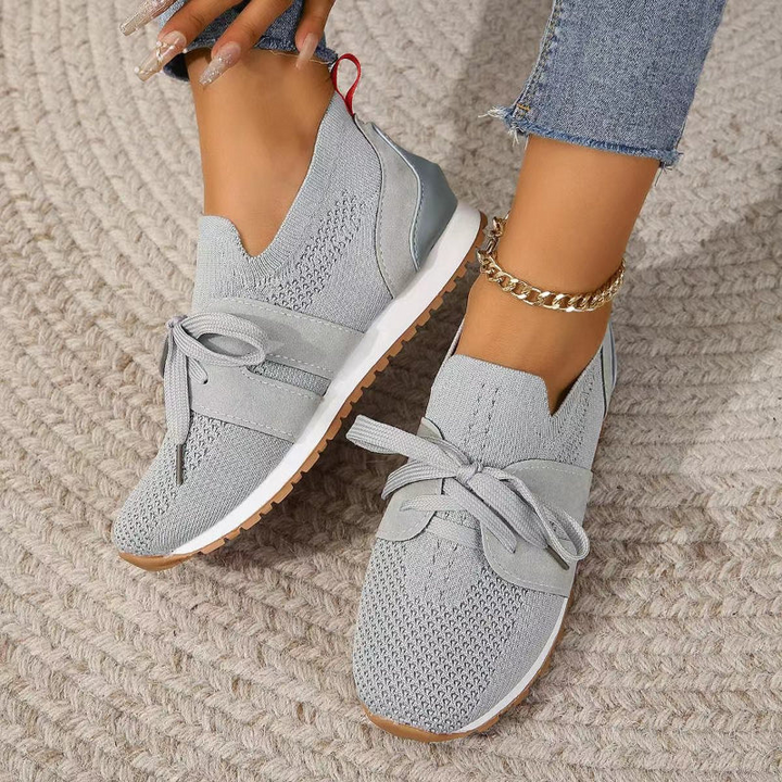 Gray Women’s Orthopedic-Ergonomic Fit Sneakers on the model