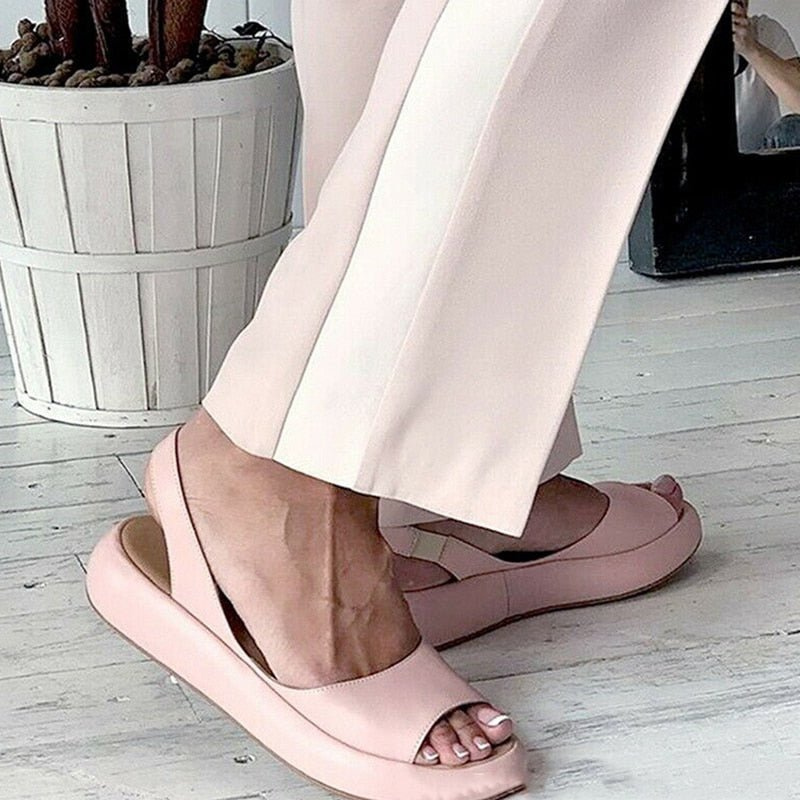 Pink Women’s Casual Footbed Slip-On Sandals on the model