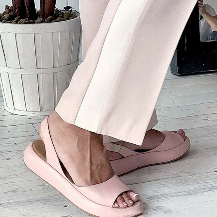 Pink Women’s Casual Footbed Slip-On Sandals on the model