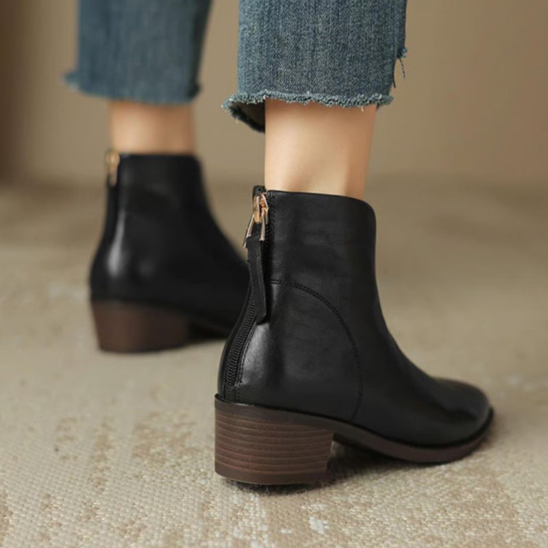 Black Women’s Elegant Block Heel Ankle Boots on the model