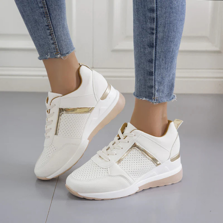 White Women’s Orthopedic Comfort Heel Sneakers on the model