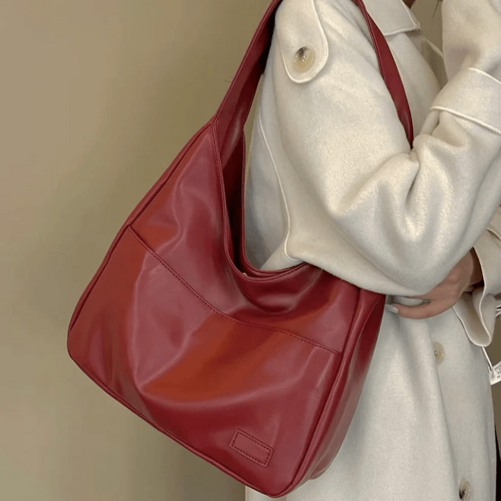 Women’s Red Spacious Leather Shoulder Bag on model