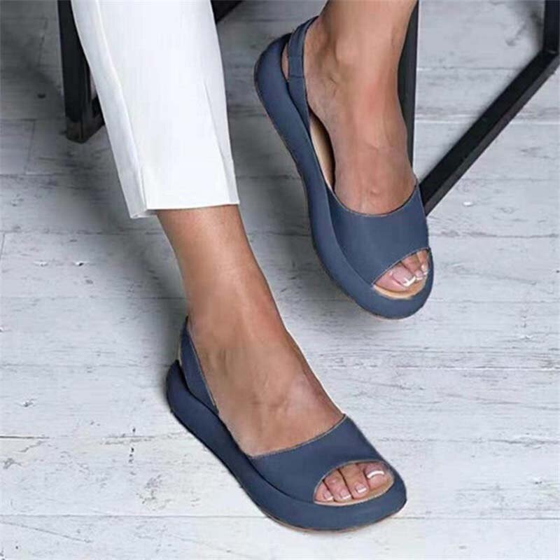 Blue Women’s Casual Footbed Slip-On Sandals on the model