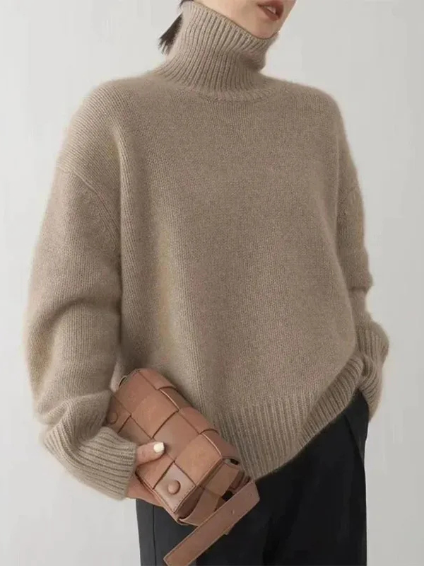 Camel Women’s Soft Classic Fit Turtleneck Sweater on the model