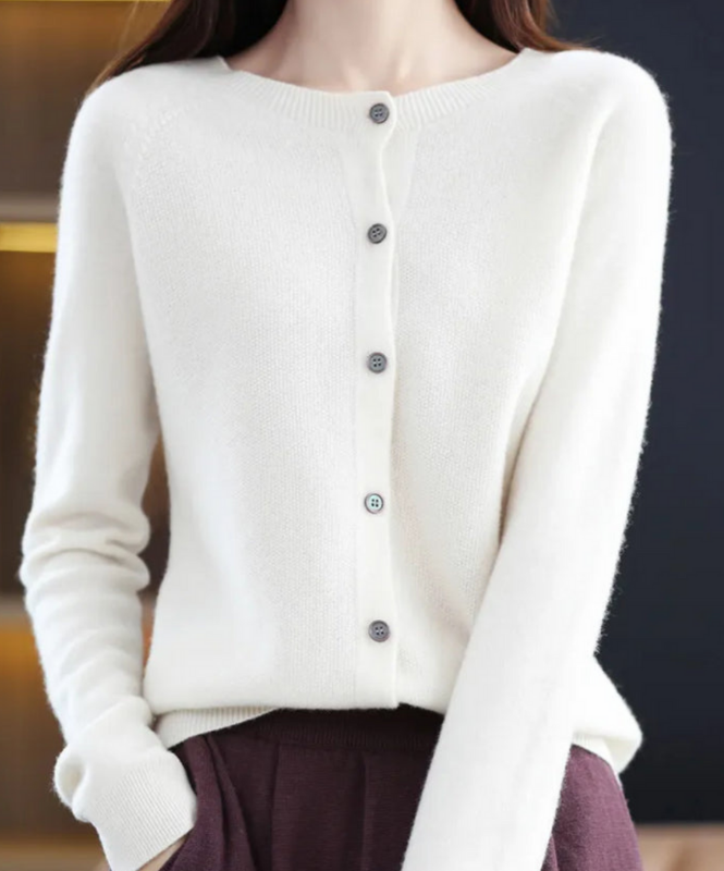 White Women’s Elegant V-Neck Button-Detailed Sweater on the model