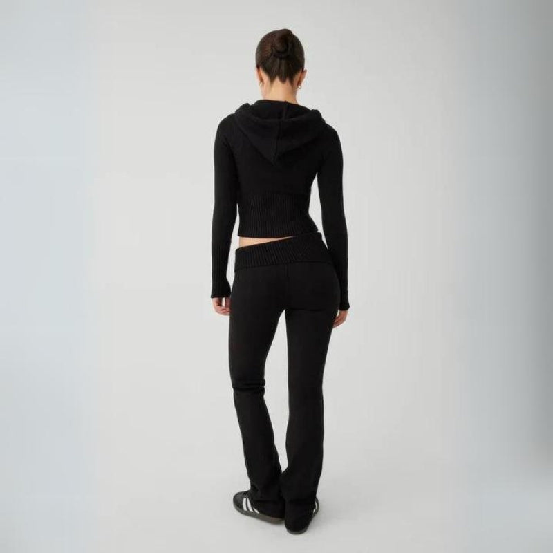 Black Women’s Cozy Fitted Zip-Up Cloud Knit Set on the model