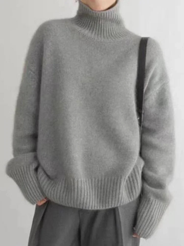 Gray Women’s Soft Classic Fit Turtleneck Sweater on the model