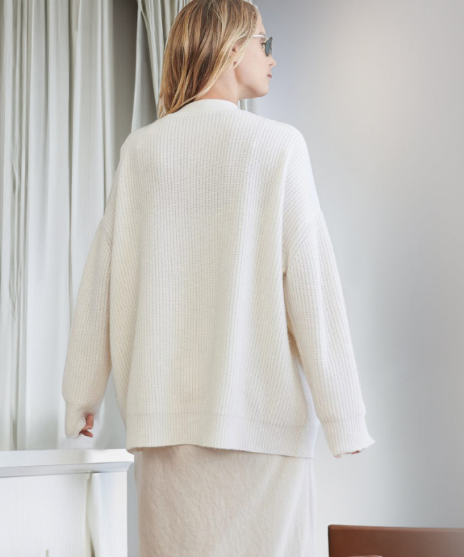 Ivory Women’s V-Neck Button Closure Knit Cardigan on the model