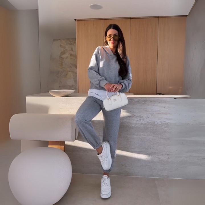 Gray Women’s Coordinated Minimalist Fit Tracksuit Set on the model