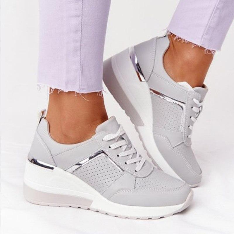Gray Women’s Orthopedic Comfort Heel Sneakers on the model