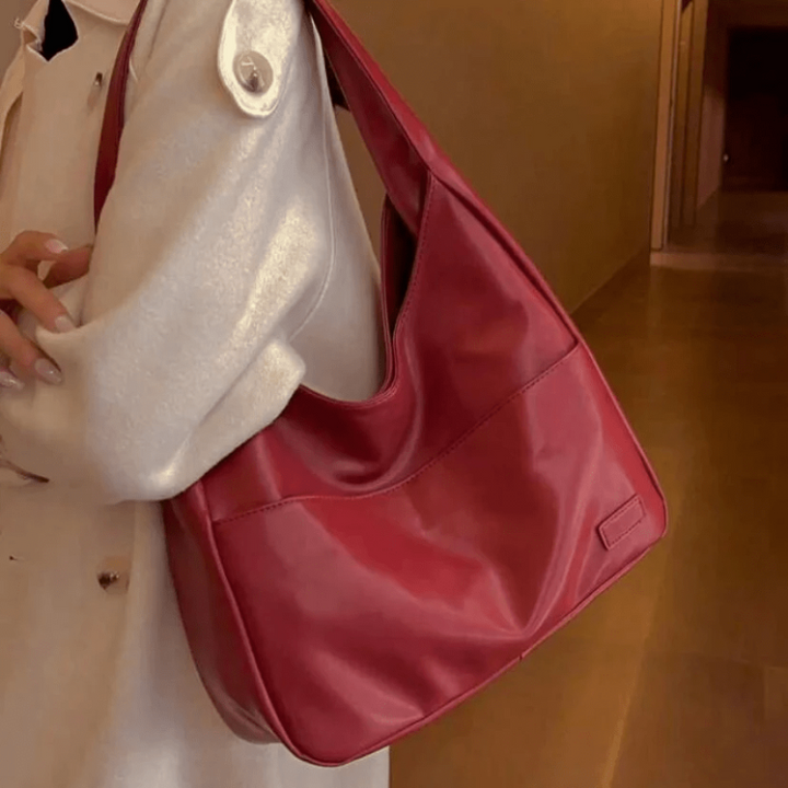 Women’s Red Spacious Leather Shoulder Bag on model