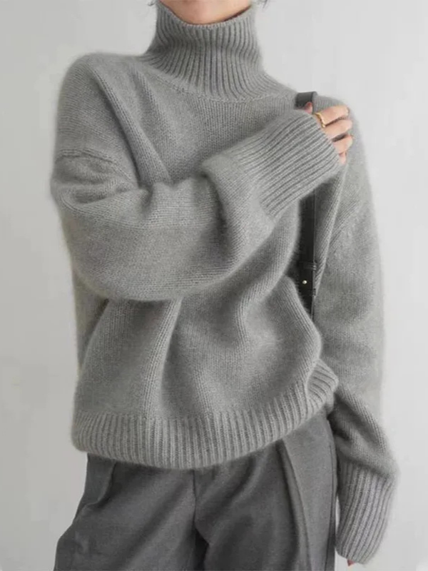 Gray Women’s Soft Classic Fit Turtleneck Sweater on the model