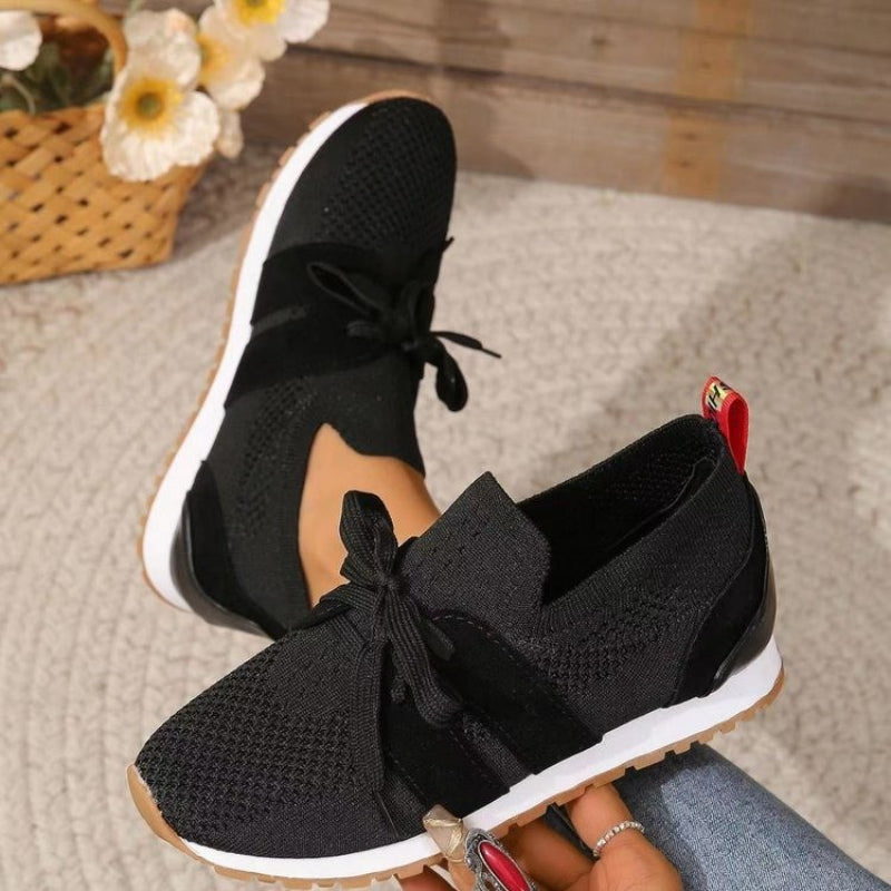 Black Women’s Orthopedic-Ergonomic Fit Sneakers on the model