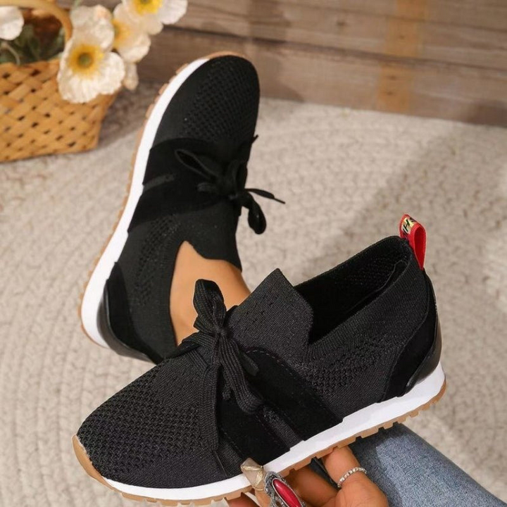 Black Women’s Orthopedic-Ergonomic Fit Sneakers on the model