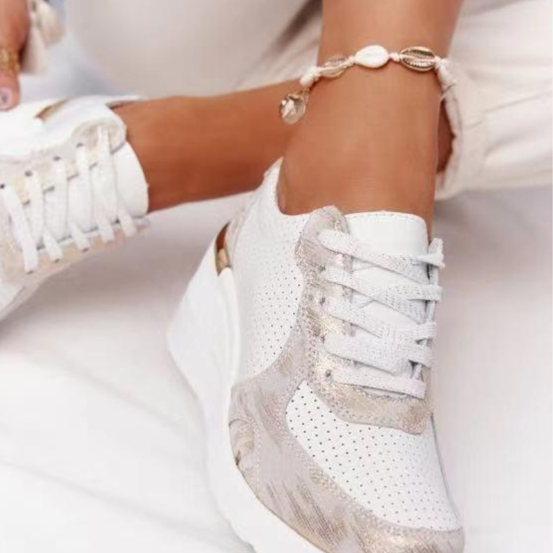 White Women’s Orthopedic Comfort Heel Sneakers on the model