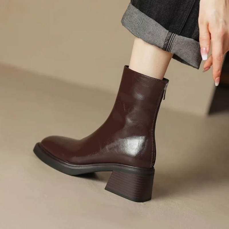 Brown Women’s Modern Square Toe Ankle Boots on the model
